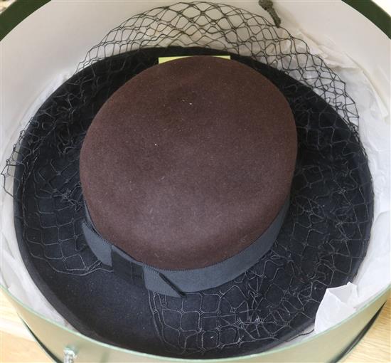 A ladies hat, in a Harrods box, unused